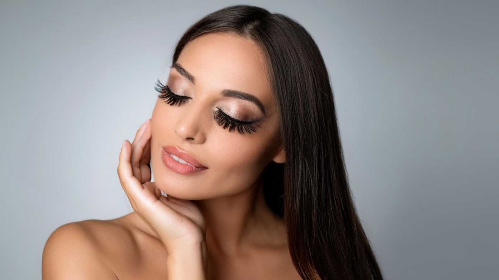 A model wearing vegan faux mink lashes, demonstrating the luxurious and natural look of cruelty-free lashes